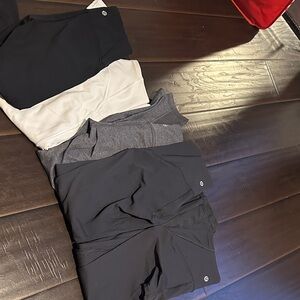 Bundle of 5 lululemon leggings size 4 25” inseam
1 white 
1 black 
3 grey